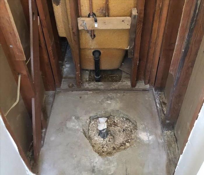 Removed Toilet and Damaged Drywall