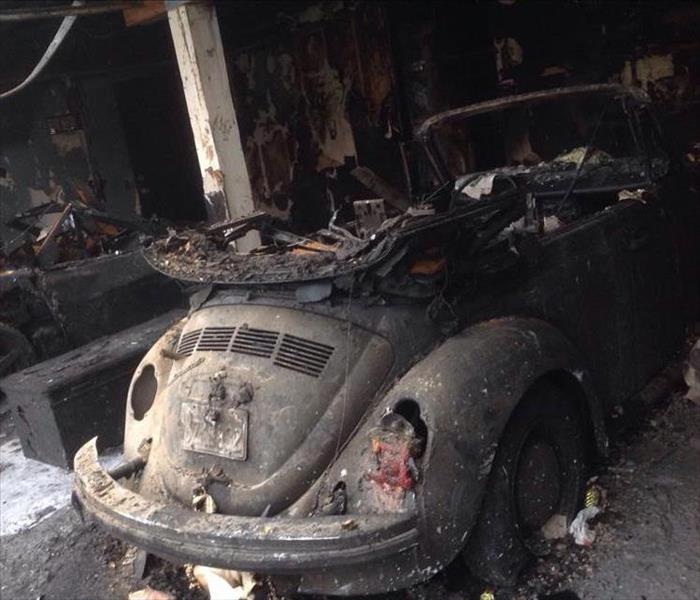 Car Starts Fire In Garage